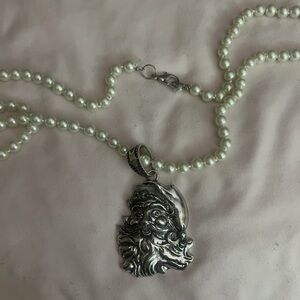 Silver Pearl Santa necklace. 30 inch